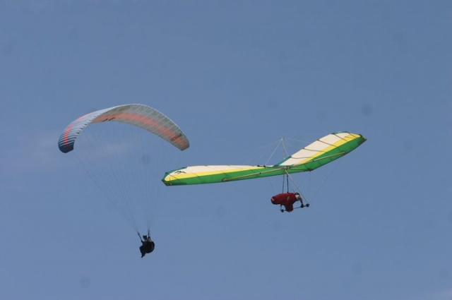  Paragliding and hang gliding in the sky 